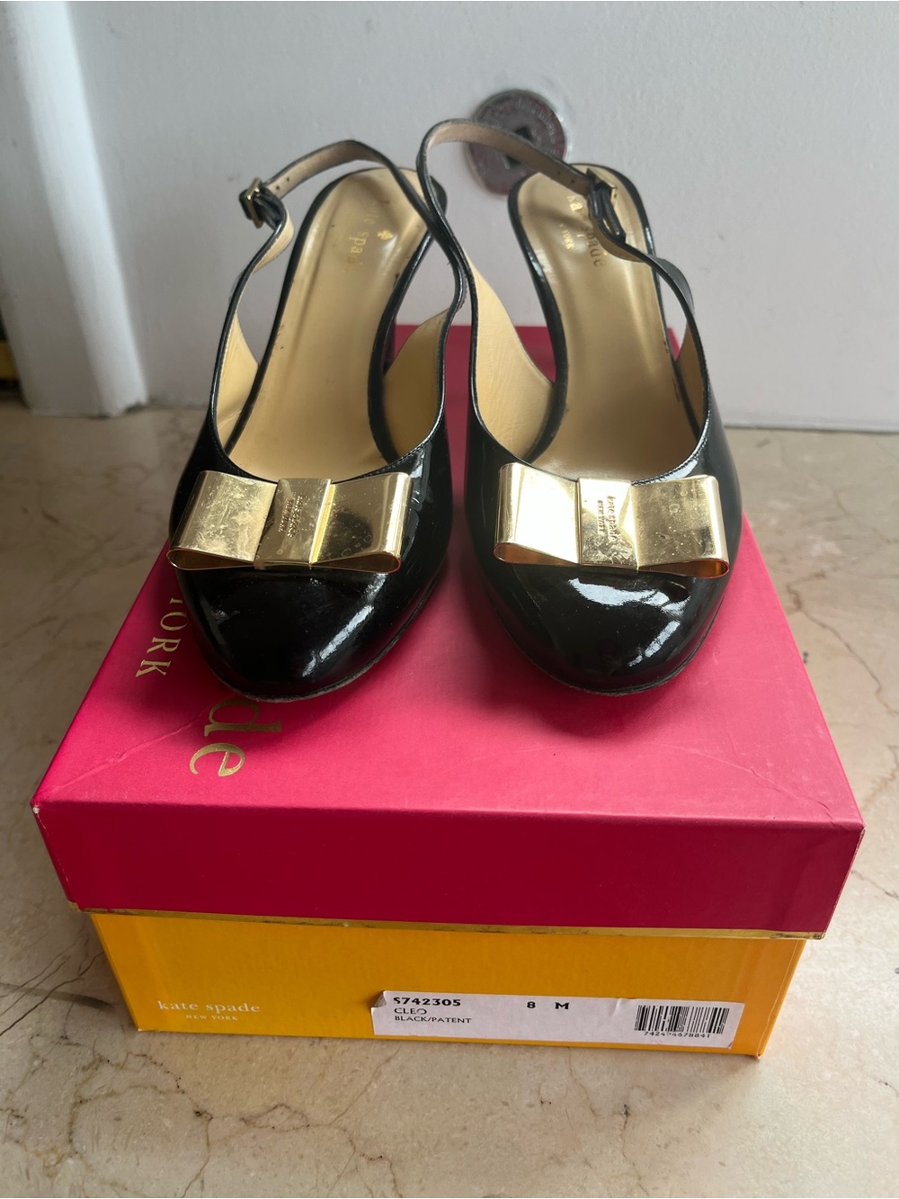 kate spade Black Patent Slingback Pumps with Gold Bow Accent